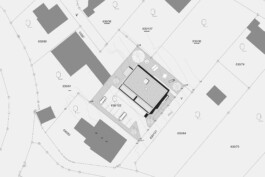 Mehrfamilienhaus in einen Schwarzplan mit Grundstücksgrenzen 
